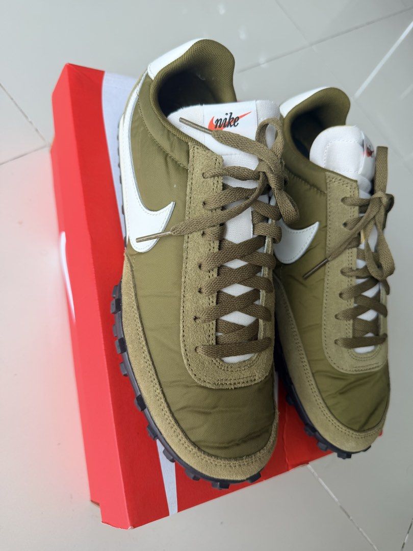 Nike Waffle Trainer 2 SE Olive Green White (Category: Sneakers) located in Quezon City. Submitted by shoppingaccount8888 (Listing ID 1460334242, Image 1). Description: - Olive green Nike Waffle Trainer 2 SE sneakers - White accents on the swoosh and heel tab - Includes original box - Classic retro design.