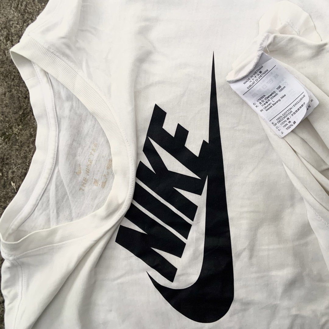 Nike White T-shirt with Black Logo (Category: Tshirts & Polo Shirts ) located in Tabaco. Submitted by bayhust (Listing ID 1460451796, Image 2). Description: 21x27 EXCELLENT 9.9/10 color rate no issue - Classic white Nike t-shirt - Features iconic black Nike swoosh logo on the front - Simple and versatile design - Ideal for everyday wear or workouts.