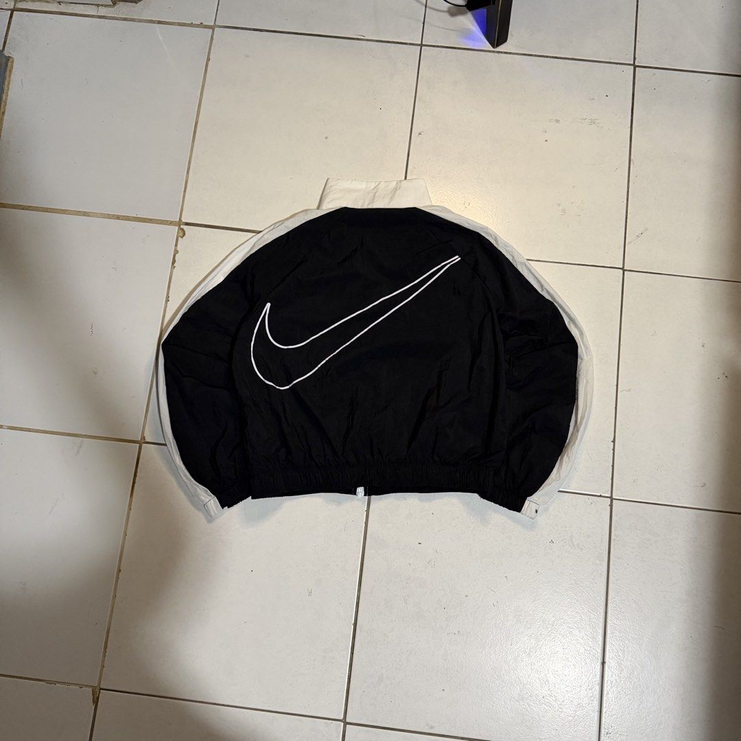 NIKE WIND BREAKER (Category: Coats, Jackets and Outerwear) located in Manila. Submitted by marx_g (Listing ID 1460501523, Image 2). Description: NIKE WINDBREAKER SMALL Width 20 Length 20 .