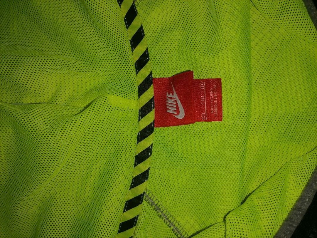 Nike Windrunner Full Zip Hoodie Jacket (Category: Coats, Jackets and Outerwear) located in Tacloban City. Submitted by jikiri.b (Listing ID 1460503432, Image 2). Description: - Nike Windrunner Jacket - Size: XXL - Color: Grey and Lime Green - Design: Geometric pattern on chest and hood - Features: Full zip closure - Origin: Made in China - Ideal for: Sports or casual wear - bakbak chest logo but still good as good.