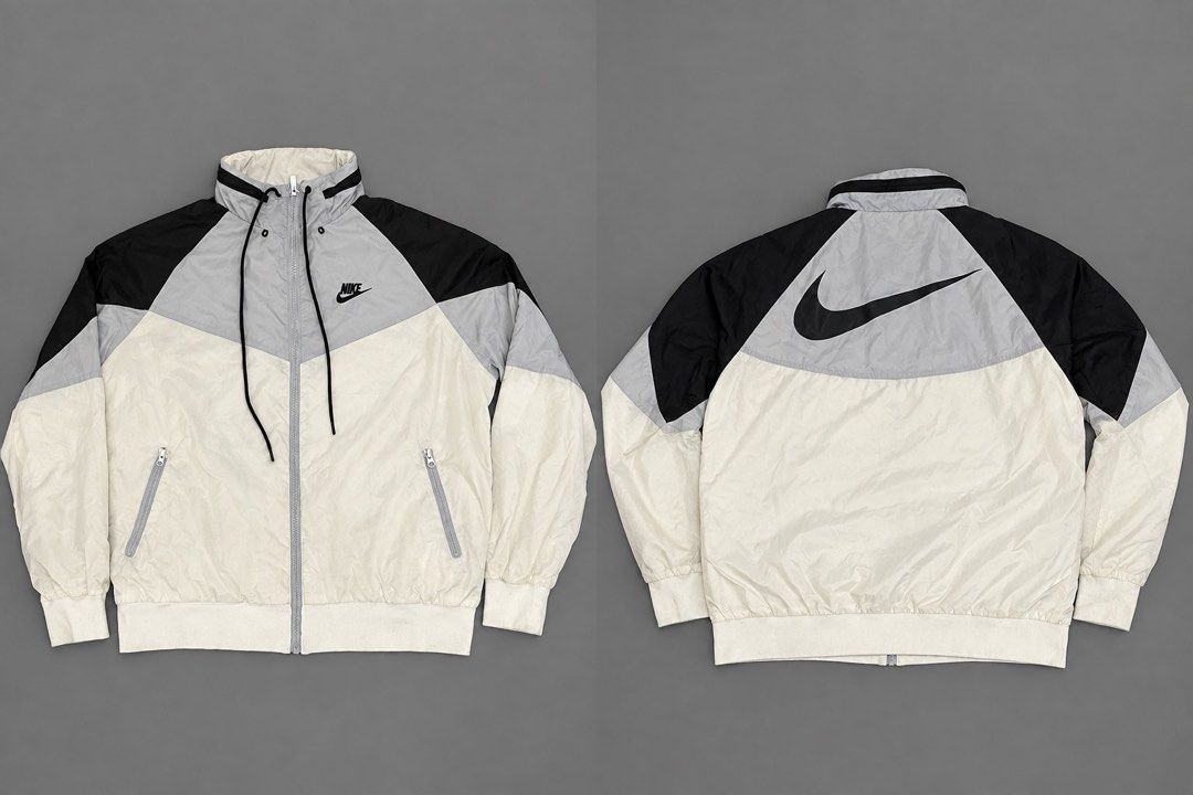 Nike Windrunner Jacket Colorblock Swoosh (Category: Coats, Jackets and Outerwear) located in Manila. Submitted by jelooo_29 (Listing ID 1460337342, Image 1). Description: - Classic Nike Windrunner jacket - Iconic colorblock design - Large Nike swoosh on the back - Lightweight material, perfect for layering - Two front zip pockets - Drawstring hood - Ideal for casual wear or light athletic activities.