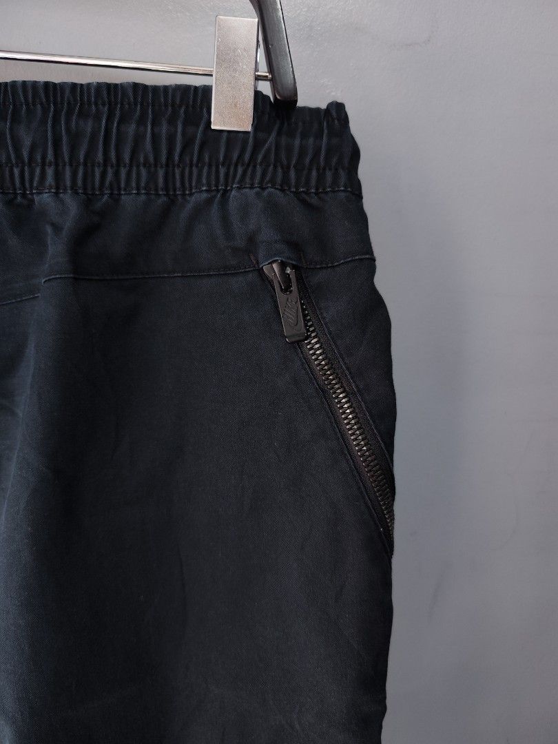 Nike Woven Zipper Shorts (Category: Shorts) located in Bulacan. Submitted by emilj23 (Listing ID 1460429207, Image 3). Description: Nike Woven Zipper Shorts Size XL on tag L 20 W 34-38 Leg Hole 9.5 Condition 9/10 Color rate 9/10 No Issue.
