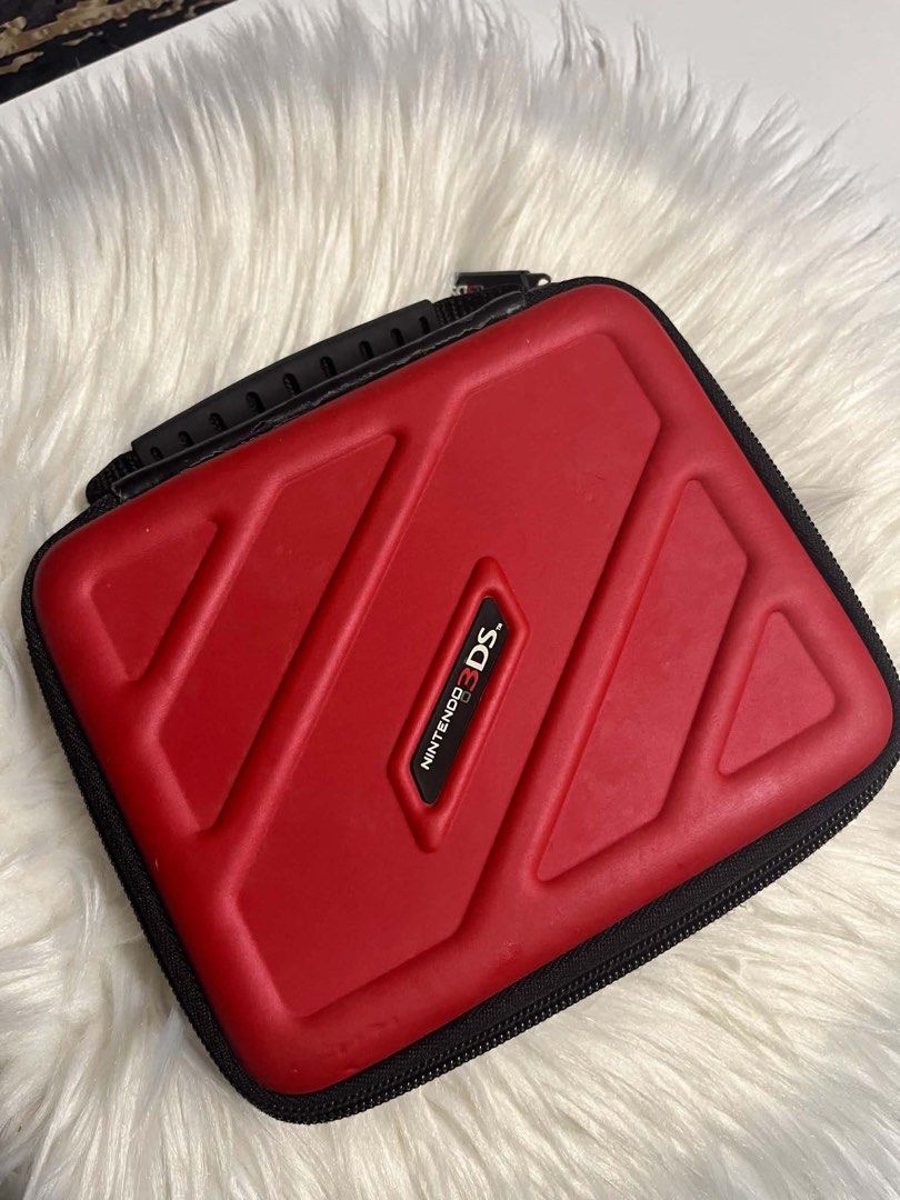 Nintendo 2DS (Category: Other Mobile & Gadget Accessories) located in Caloocan City. Submitted by trebdy01 (Listing ID 1460397530, Image 2). Description: Selling Price: ₱9,500 slightly negotiable for sure buyer Your bundle includes: * Red Nintendo 2DS * 4 original USA games: Pokémon Ultra Sun, (₱2,650) Pokémon Omega Ruby, (₱1,500) Tomodachi Life, (₱2,000-3000) Super Mario Maker(₱700) * Red Nintendo 3DS-style carrying bag * 4GB SD card * Black sty
