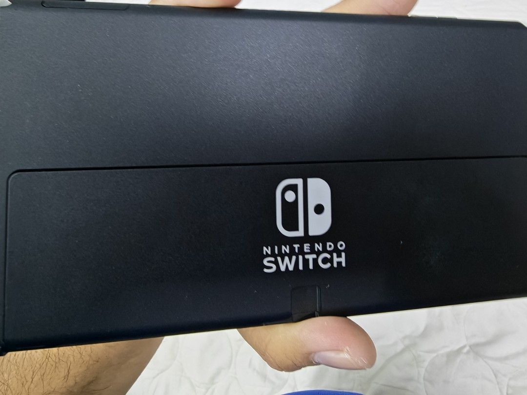 Nintendo switch oled (Category: Nintendo) located in Johor Bahru. Submitted by thehobbyguy (Listing ID 1460436813, Image 3). Description: want to sell Nintendo switch oled jarang main dapat accessories macam case complete ada charger termasuk memory card 128gb condition cun berminat boleh pm .