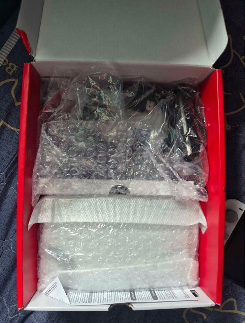 Nintendo Switch OLED (Category: Nintendo) located in Makati City. Submitted by stuhxoo (Listing ID 1460464143, Image 3). Description: Nintendo Switch OLED White Switch #2 Inclusions: - Box - Screen Protector - Dobe Joy-Con Grip (White) - Joy-Con Grip - Dock - HDMI Cable - Charger - Joycon Straps .