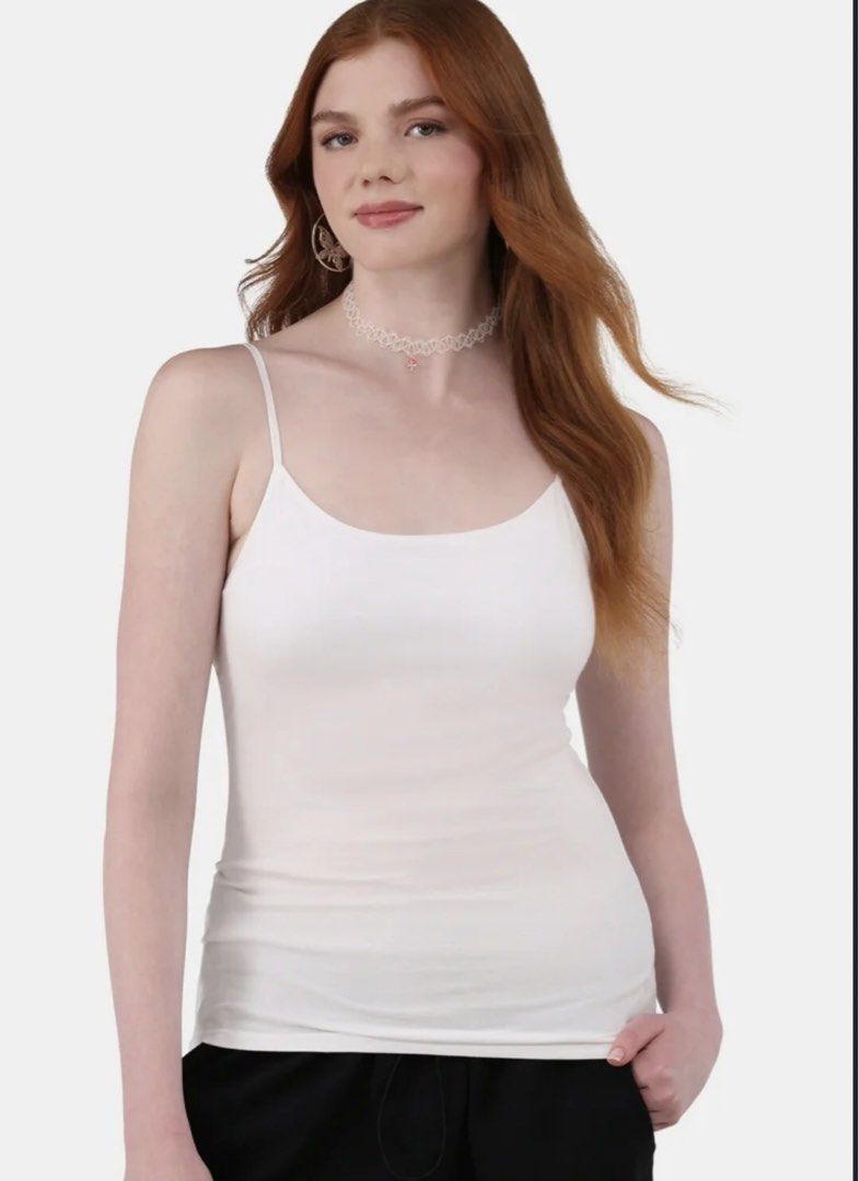 NO BOUNDARIES 🇺🇸White Spaghetti Strap Camisole TopXL (Category: Sleeveless) located in Calapan. Submitted by shakalak (Listing ID 1460418802, Image 2). Description: - Basic white camisole top - Thin spaghetti straps - Stretchy and comfortable material - Ideal for layering or wearing solo - Pairs well with jeans or shorts - Essential wardrobe staple.