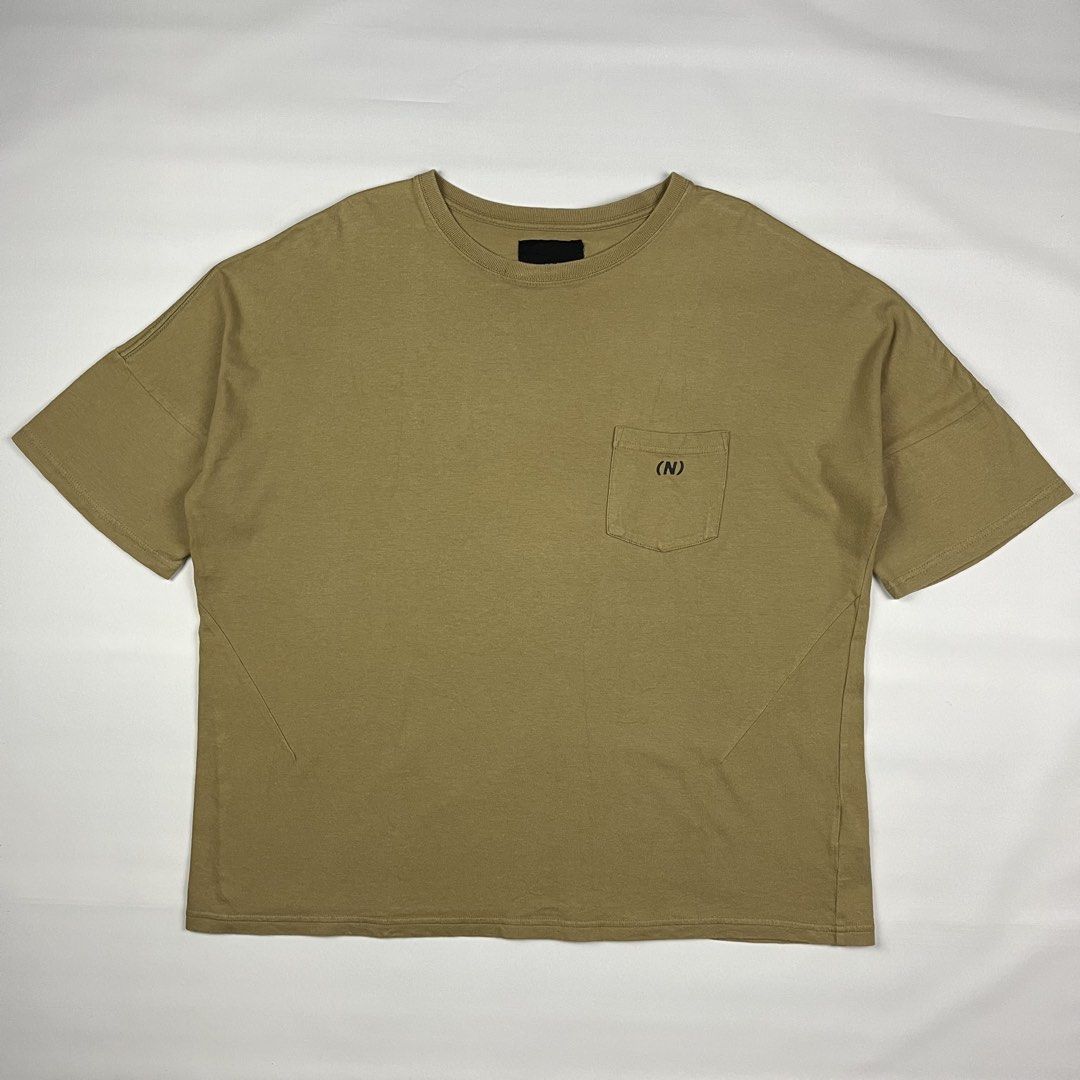 Number (N)ine - Oversized Pocket Tee (Category: Tshirts & Polo Shirts ) located in Puerto Princesa. Submitted by paradise5300 (Listing ID 1460380359, Image 2). Description: Number (N)ine - Oversized Pocket Tee Tagged Size: Small / best fit Medium Dimensions Inches length: 26.5 Inches width: 23 Condition: Excellent Color rate: 9.5 Flaws: None 1,999 shipping fee is not yet included. .
