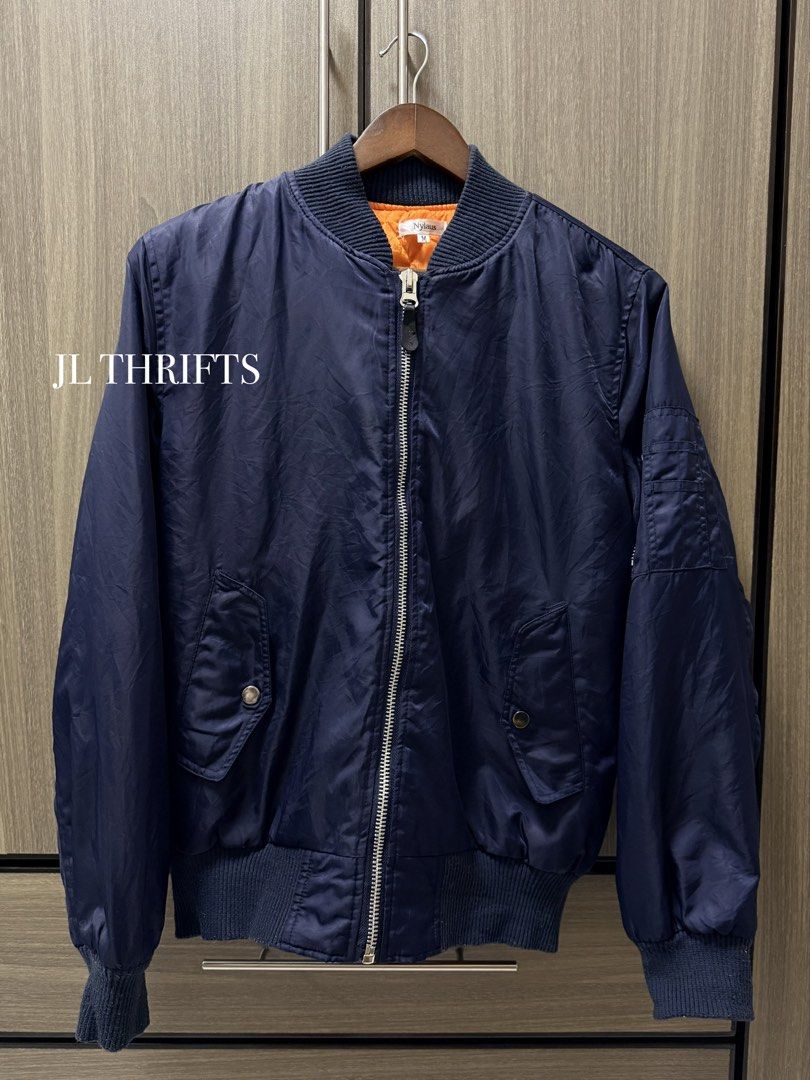 NYLAUS Navy Blue Quilted Full Zip Jacket (Category: Coats, Jackets and Outerwear) located in Cavite. Submitted by jlthrifts_ (Listing ID 1460489104, Image 1). Description: Brand: Nylaus Size: Medium Length: 25 Width: 22 w/ arm pocket.