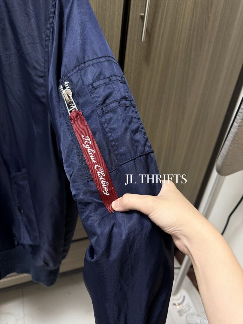 NYLAUS Navy Blue Quilted Full Zip Jacket (Category: Coats, Jackets and Outerwear) located in Cavite. Submitted by jlthrifts_ (Listing ID 1460489104, Image 2). Description: Brand: Nylaus Size: Medium Length: 25 Width: 22 w/ arm pocket.