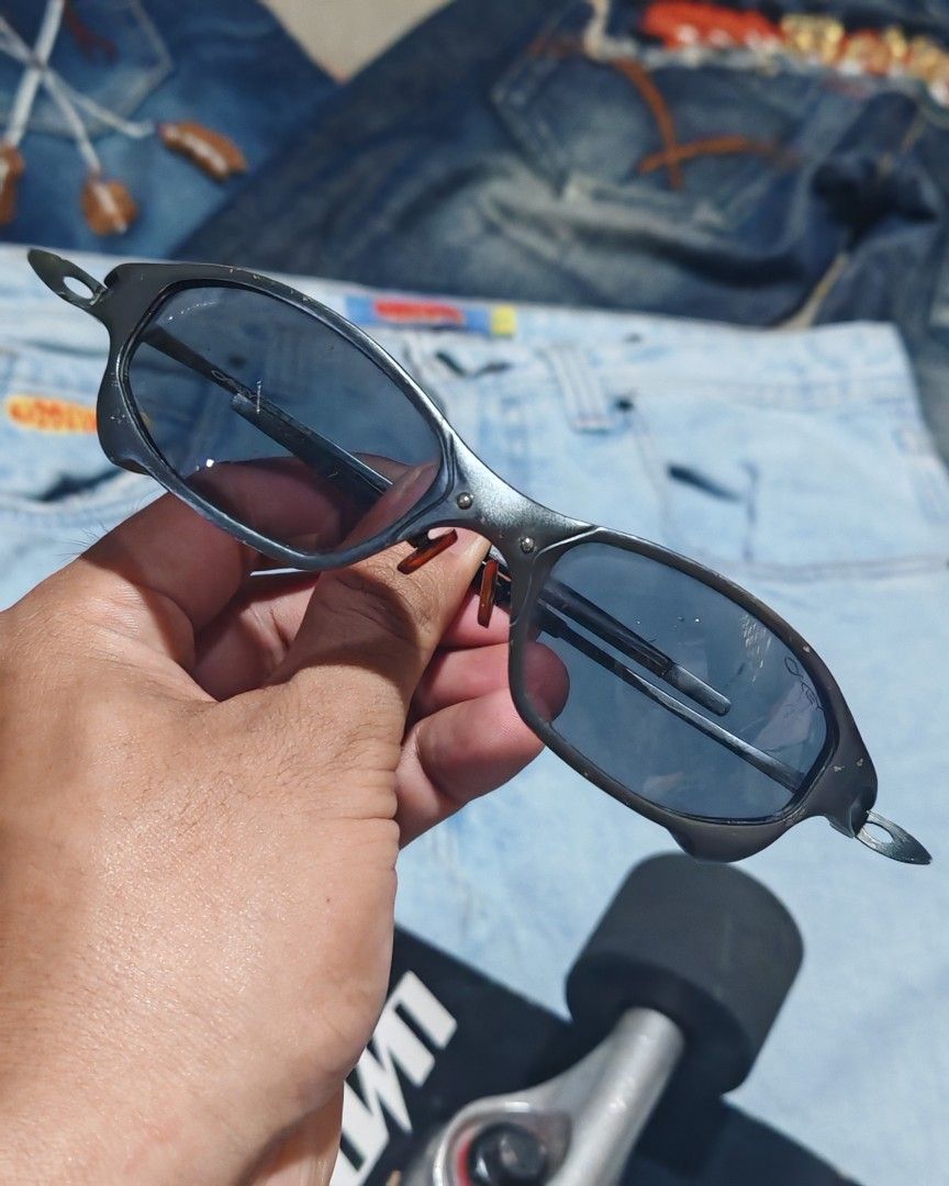 Oakley X-Metal Juliet (Category: Sunglasses & Eyewear) located in Camalig. Submitted by 50thrifty (Listing ID 1460475280, Image 1). Description: Off/Fake‼️ These appear to be metal-framed sunglasses resembling the Oakley Juliet design, featuring dark lenses and a textured gray metallic finish..