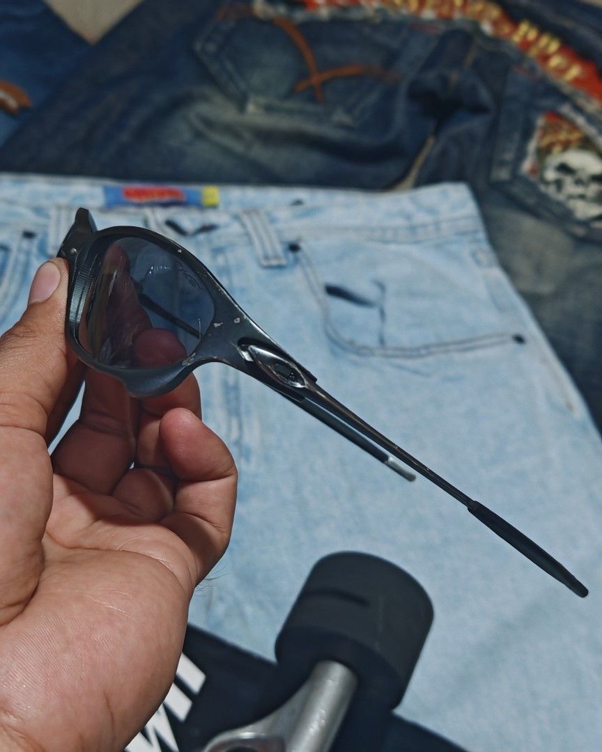 Oakley X-Metal Juliet (Category: Sunglasses & Eyewear) located in Camalig. Submitted by 50thrifty (Listing ID 1460475280, Image 2). Description: Off/Fake‼️ These appear to be metal-framed sunglasses resembling the Oakley Juliet design, featuring dark lenses and a textured gray metallic finish..