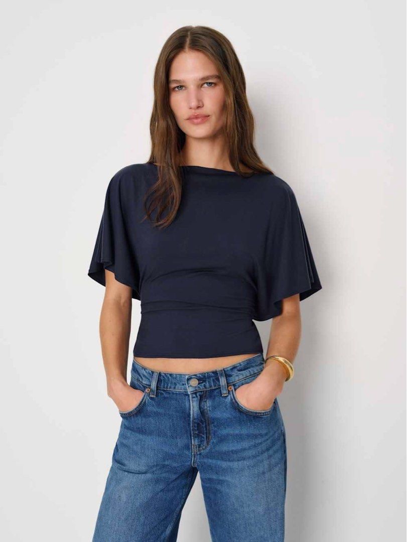 Oasis Collection Deep Blue Dark Teal One Shoulder Batwing Top (Category: Others Tops) located in Las Pinas. Submitted by kylloren_ (Listing ID 1460017259, Image 1). Description: - fits semi m to m frames - 1st pic is inspo :3 helping tags [h&m, mango, zara, uniqlo, brandy melville, princess polly, y2k, coquette, dainty, vintage, early 2000s, grunge, cottagecore, basics, preppy, goth, fairycore, fairy, edikted, hollister, miu the label, isa the la