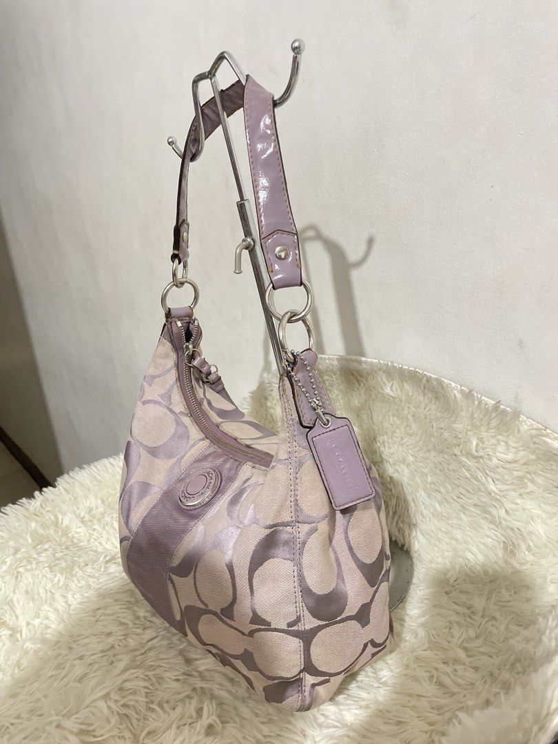 OG Coach Purple Hobo Shoulder Bag (Category: Luxury Bags & Wallets) located in Manila. Submitted by pelaezmaxine_ (Listing ID 1460442828, Image 3). Description: OG C04ch Purple Hobo Bag! ⤷ DM ME YOUR OFFERˎˊ˗ ୨ৎ: size: small-medium (can fit an ipad) ୨ৎ: Exterior & Interior is Rank A. Signs of usage. No rubs in the canvas. Cleaning is a must! (See all pics and vid for your reference) ୨ৎ: for personal use only. Not advisable for reselling :)) ୨ৎ: t