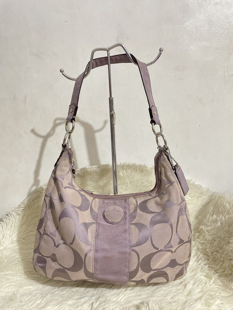 OG Coach Purple Hobo Shoulder Bag (Category: Luxury Bags & Wallets) located in Manila. Submitted by pelaezmaxine_ (Listing ID 1460442828, Image 1). Description: OG C04ch Purple Hobo Bag! ⤷ DM ME YOUR OFFERˎˊ˗ ୨ৎ: size: small-medium (can fit an ipad) ୨ৎ: Exterior & Interior is Rank A. Signs of usage. No rubs in the canvas. Cleaning is a must! (See all pics and vid for your reference) ୨ৎ: for personal use only. Not advisable for reselling :)) ୨ৎ: t