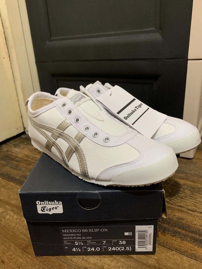 Onitsuka Tiger Mexico 66 Slip-On White Silver (Category: Sneakers) located in Pasig City. Submitted by emyzizzle (Listing ID 1460407176, Image 3). Description: - Onitsuka Tiger Mexico 66 Slip-On Bought in Japan, complete with box & paper bag - Color: White with Silver Stripes - Size: US Women's 7 (24cm) - Condition: Brand New with Tags and Original Box - Features: Easy slip-on design - Ideal for: Casual wear and everyday comfort.