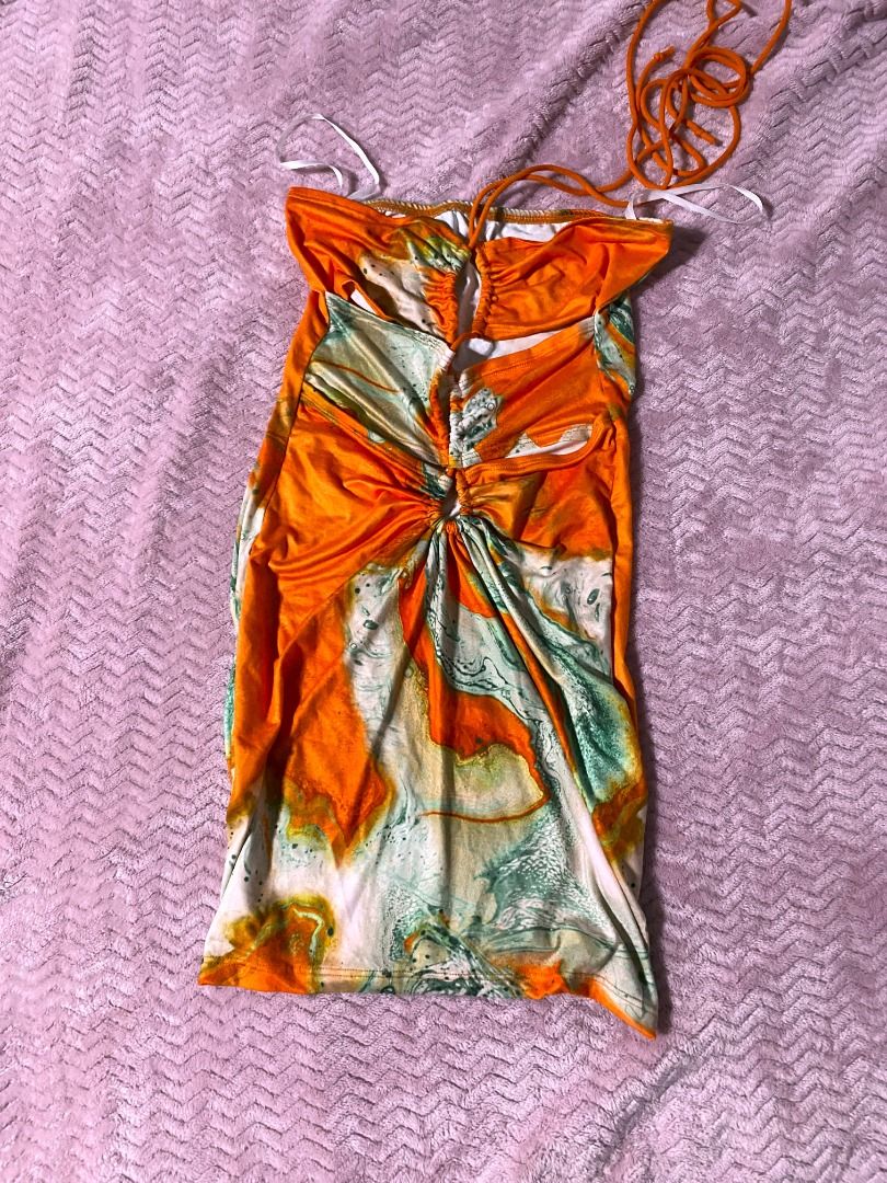 Orange Abstract Halter Tie-Front Beach Ruched Mini Dress (Category: Dresses) located in Manila. Submitted by diorellecoeur_xxx02 (Listing ID 1460305633, Image 1). Description: .