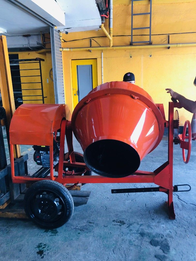 Orange Cement Mixer with Engine (Category: Construction Tools & Equipment) located in Cabuyao City. Submitted by emmanz1133 (Listing ID 1460305976, Image 1). Description: A-FRAME PREMIUM ONE BAGGER CEMENT MIXER WITH YAMATO GASOLINE ENGINE 7.5HP (Big Gears) FOR ONLY 34,999✅✅ 300L Capacity: 1 Bagger Engine: Gasoline Bowl: 5MM Side Thickness: 3mm Bottom Thickness: 5mm FREE FREE FREE 👇 👇 OPTION 1: WADFOW INVERTER WELDING MACHINE WITH FREE CORDLESS 