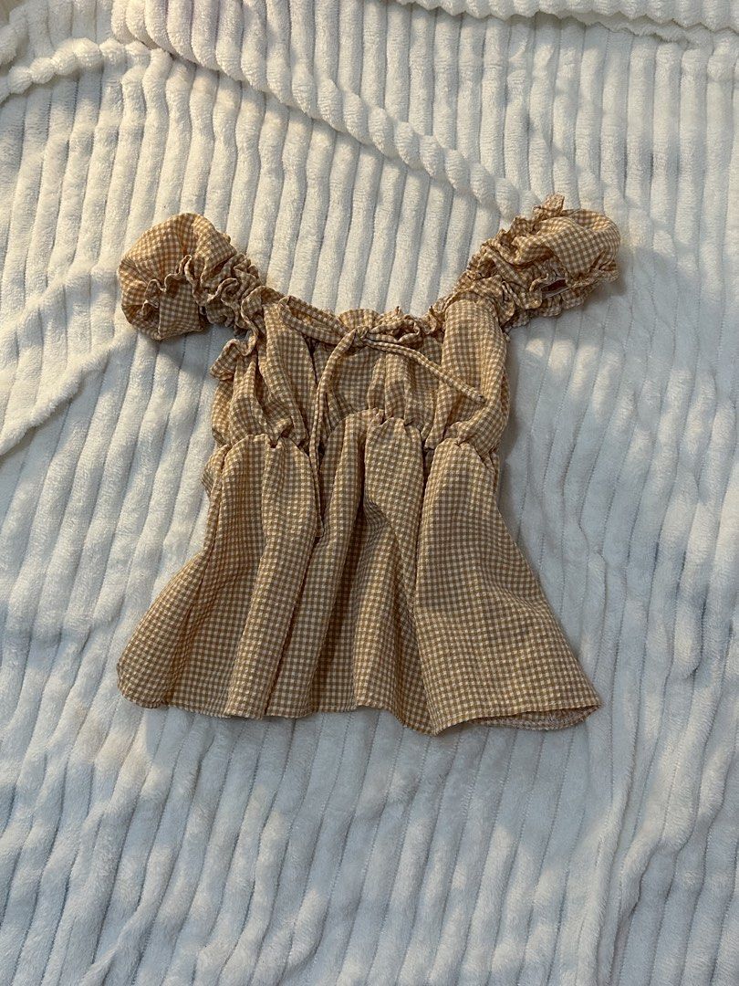 Orange coquette peplum top (Category: Blouses) located in San Pedro. Submitted by bubbles_cutie (Listing ID 1460340040, Image 1). Description: Never been worn, not my style anymore. Free size very stretchy siya.