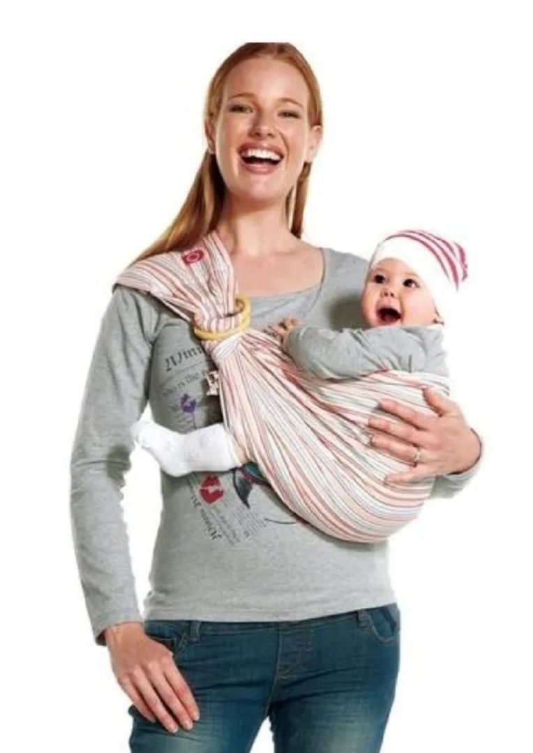ORANGE SLING BABY CARRIER (Category: Carriers & Slings) located in Cagayan de Oro. Submitted by littlebabyscarrier (Listing ID 1460439614, Image 1). Description: Orange Sling Baby Carrier Newborn baby up to 4yrs old.