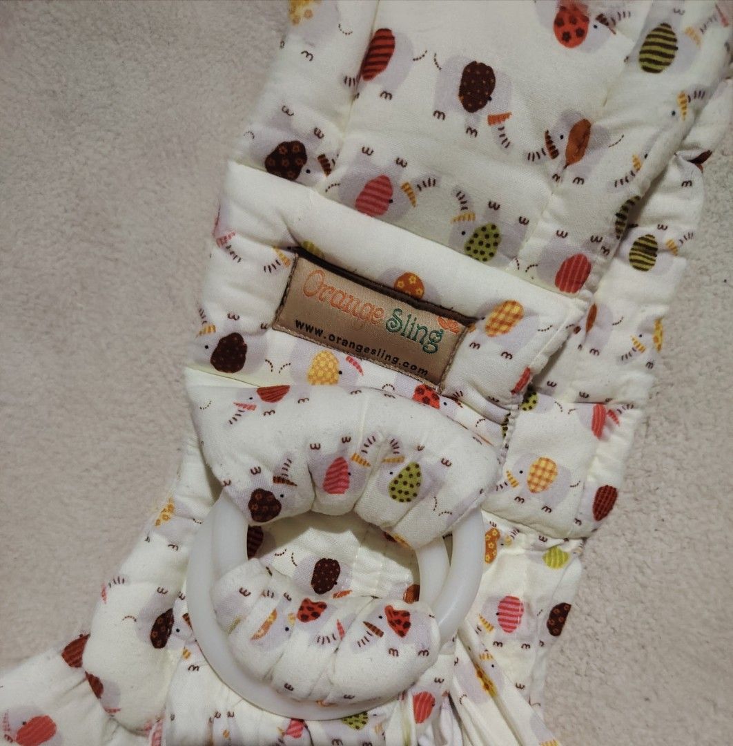 ORANGE SLING BABY CARRIER (Category: Carriers & Slings) located in Cagayan de Oro. Submitted by littlebabyscarrier (Listing ID 1460439614, Image 3). Description: Orange Sling Baby Carrier Newborn baby up to 4yrs old.