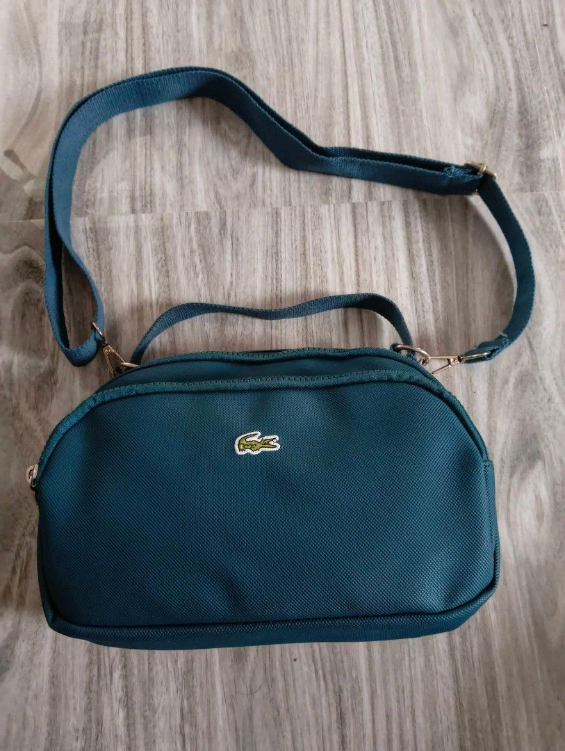 Original Lacoste bag (Category: Cross-body Bags) located in Balungao. Submitted by naysthrifta (Listing ID 1460306553, Image 2). Description: Original Lacoste bag ✅Brand new condition ✅10/10 color rate ✅No issue ✅ Embroidered Logo ✅Good po daily or pang travel 1300+sf💸 📥📥📥.