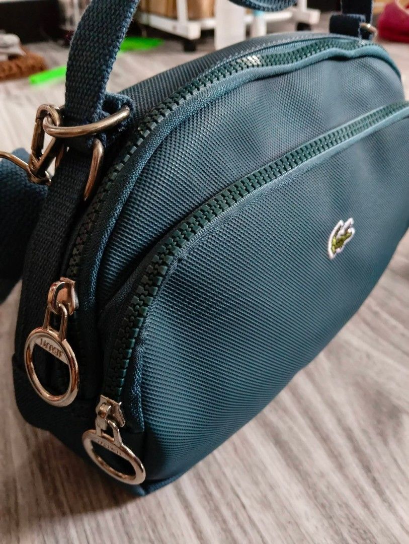 Original Lacoste bag (Category: Cross-body Bags) located in Balungao. Submitted by naysthrifta (Listing ID 1460306553, Image 3). Description: Original Lacoste bag ✅Brand new condition ✅10/10 color rate ✅No issue ✅ Embroidered Logo ✅Good po daily or pang travel 1300+sf💸 📥📥📥.