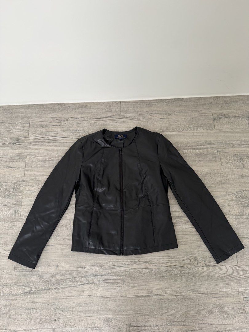OVS Black Leather Jacket (Category: Coats, Jackets and Outerwear) located in Manila. Submitted by celestial08 (Listing ID 1460441727, Image 2). Description: Pre-loved and still wearable, but has visible peeling on the shoulder area and other signs of use. Please see photos for the condition and flaw. Selling as-is..