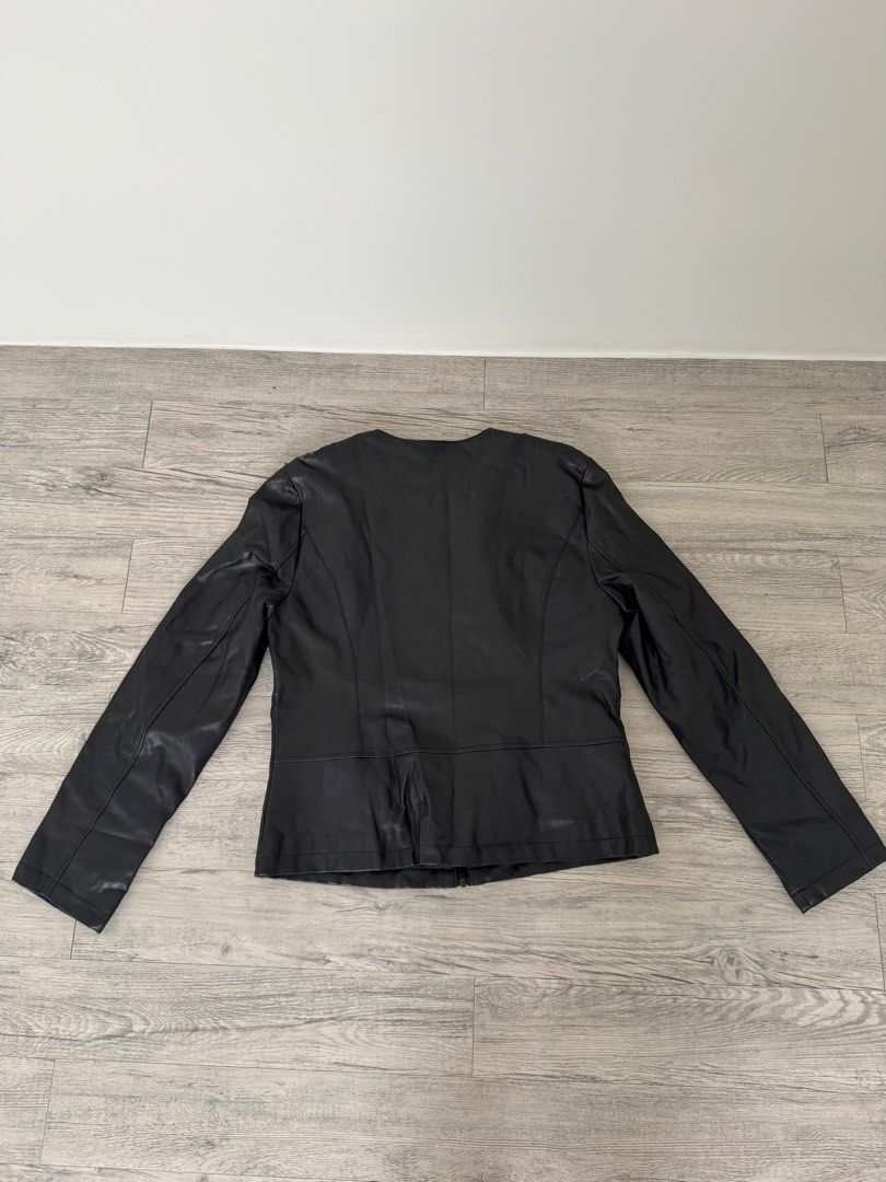OVS Black Leather Jacket (Category: Coats, Jackets and Outerwear) located in Manila. Submitted by celestial08 (Listing ID 1460441727, Image 3). Description: Pre-loved and still wearable, but has visible peeling on the shoulder area and other signs of use. Please see photos for the condition and flaw. Selling as-is..