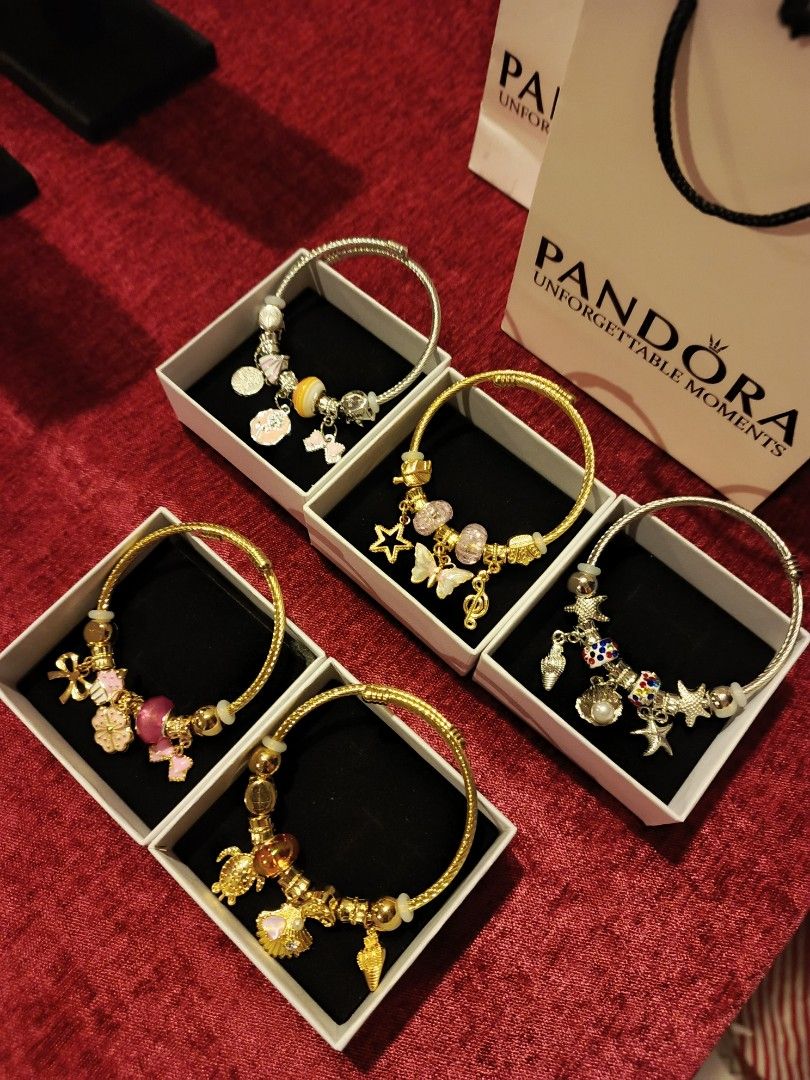 Pandora Bangle Bracelet (Category: Luxury Accessories) located in Malasiqui. Submitted by foundco_finds (Listing ID 1460493960, Image 1). Description: ✨ Pandora Bangle Bracelet - 5PCS Assorted for ₱525 🛍️ Inclusions - Free box & paper bag (perfect for gift) 💳 Mode of Payment - Gcash & Bank Transfer only. FAQS 📣 Non tarnish po ba? - Yes, with proper care. 📣 With box na ba? Yes, with box included. 📣 Open for selection? - For retail, yes. For r