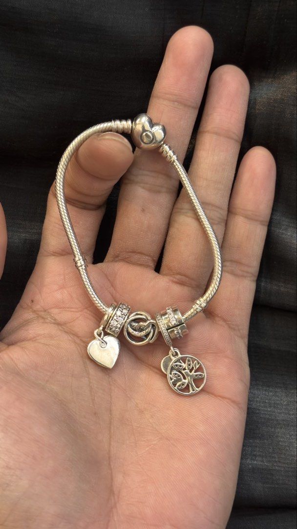 Pandora Moments Bangle Set (Category: Luxury Accessories) located in Makati City. Submitted by as_luxe (Listing ID 1460342708, Image 2). Description: ✨ AUTHENTIC PANDORA MOMENTS BANGLE SET! ✨ Up for grabs is this elegant and meaningful PANDORA Moments Bangle curated with beautiful family, love, and growth themes featuring two-tone accents! 💖🌿💰 Our Price: ₱12,000.00 Product Details: • Material: 925 Sterling Silver, shimmering pavé cubic zirconi