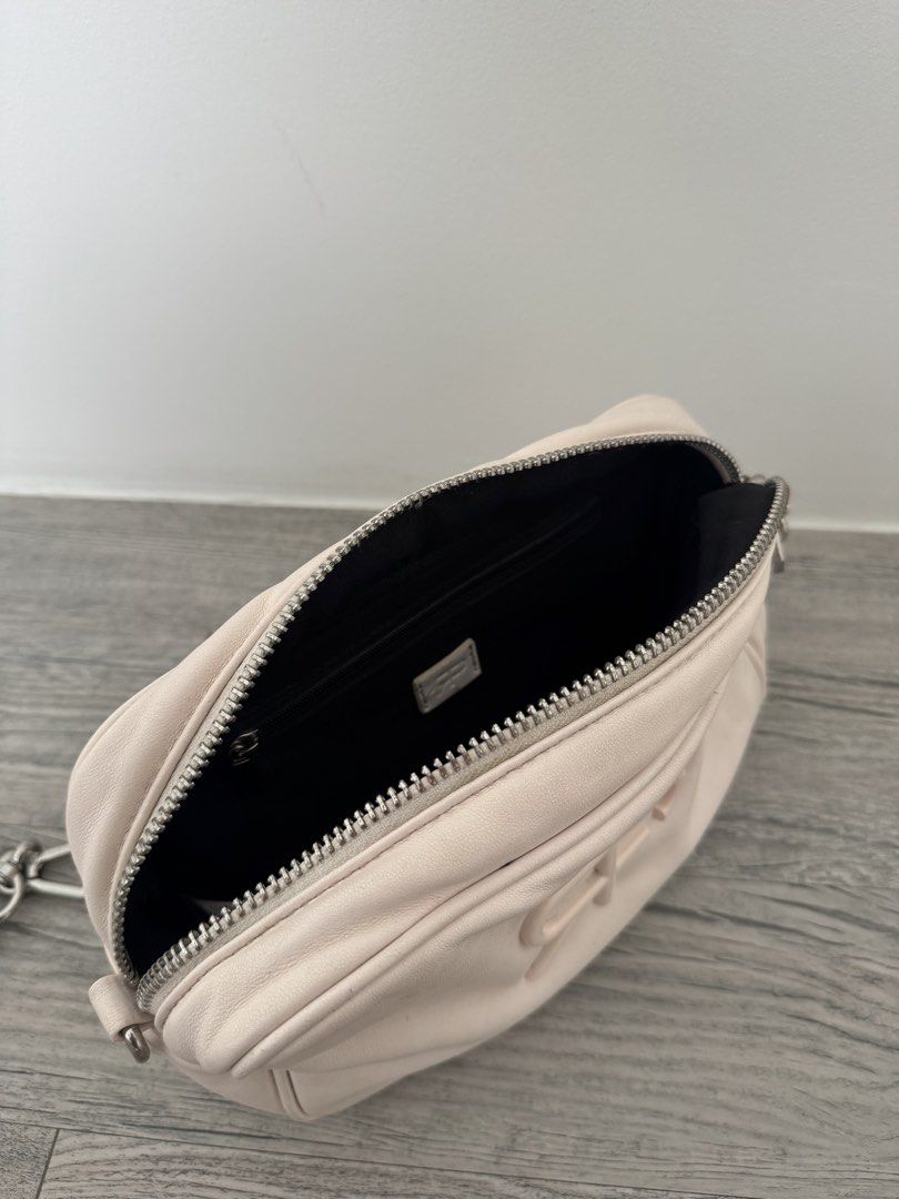 Parfois (Category: Clutches) located in Manila. Submitted by celestial08 (Listing ID 1460437026, Image 3). Description: Well-used / with visible signs of wear. Fading/discoloration and peeling on the back (see attached second photo).