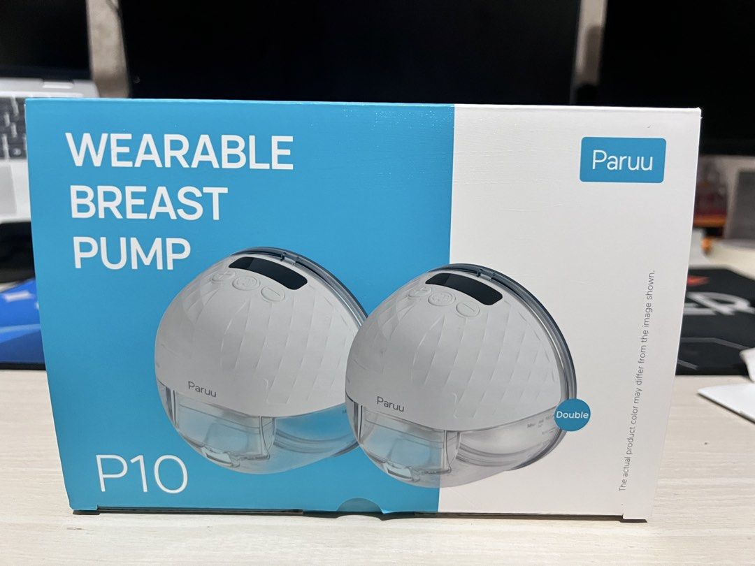 Paruu P10 Wearable Double Breast Pump (Category: Breastfeeding & Bottle Feeding) located in Batangas. Submitted by ronnachang (Listing ID 1460417854, Image 2). Description: - Paruu P10 Wearable Double Breast Pump - Hands-free design for ultimate convenience - Customizable with 3 speed settings and 9 suction levels - Intuitive LED display for easy monitoring - Simple to clean and use - Perfect for pumping on the go - Comes in original packaging.