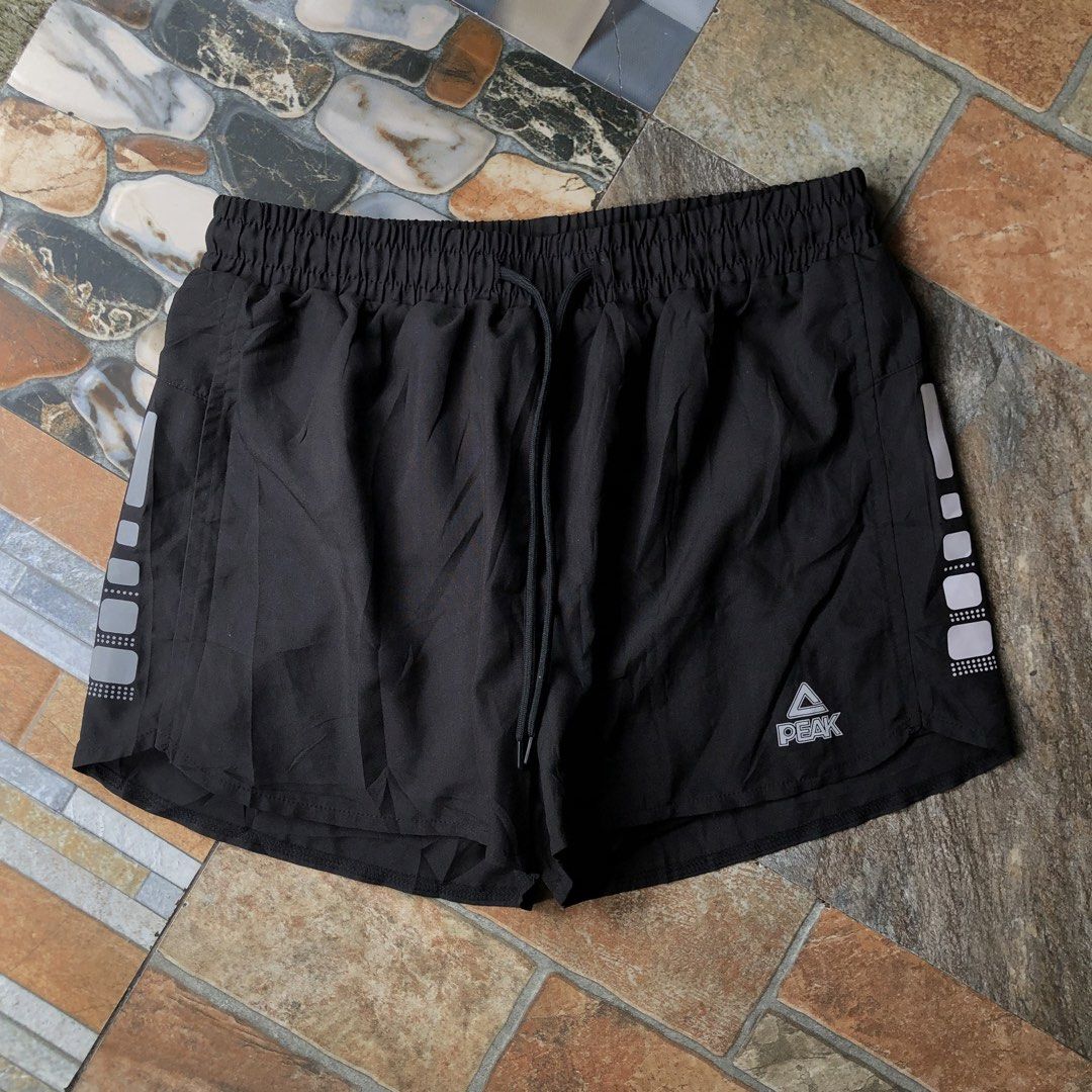 Peak Running Short (Category: Shorts) located in General Trias. Submitted by ivots (Listing ID 1460483989, Image 3). Description: L on Tag Waist 26-34 Length 12 Leg Open 11 No Issue Excellent Condition (as new , reflectorize design).
