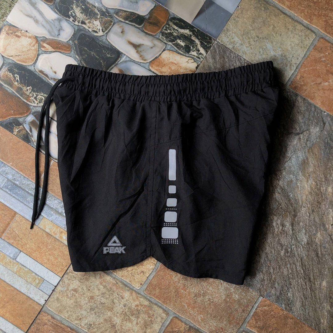 Peak Running Short (Category: Shorts) located in General Trias. Submitted by ivots (Listing ID 1460483989, Image 2). Description: L on Tag Waist 26-34 Length 12 Leg Open 11 No Issue Excellent Condition (as new , reflectorize design).