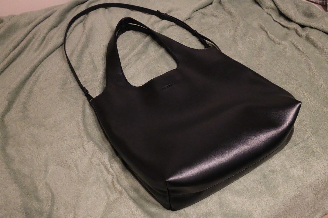 PEDRO Avery Leather Tote Bag (Category: Sling Bags) located in San Juan City. Submitted by bjmoreno (Listing ID 1460448580, Image 1). Description: Product Name: Avery Tote Bag Purchased From: PEDRO Singapore Condition: Used once during my Japan trip * With Original Dust Bag * Classic black leather tote bag from PEDRO * Simple and timeless design * Spacious interior, perfect for everyday essentials * Features an adjustable strap with buckle detail