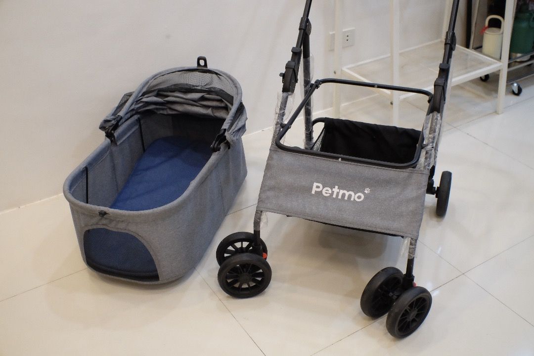 Petmo Pet Stroller - Grey (Category: Homes & Other Pet Accessories) located in Caloocan City. Submitted by marodeguzm20871 (Listing ID 1460458163, Image 2). Description: Grey Petmo Pet Stroller - Perfect for multiple small dogs or cats - Features mesh windows for excellent ventilation - Convenient storage basket underneath - Easy to fold and transport - Bought last Feb 2026 RFS: My senior shih tzu has recently passed and we couldn't use the strol