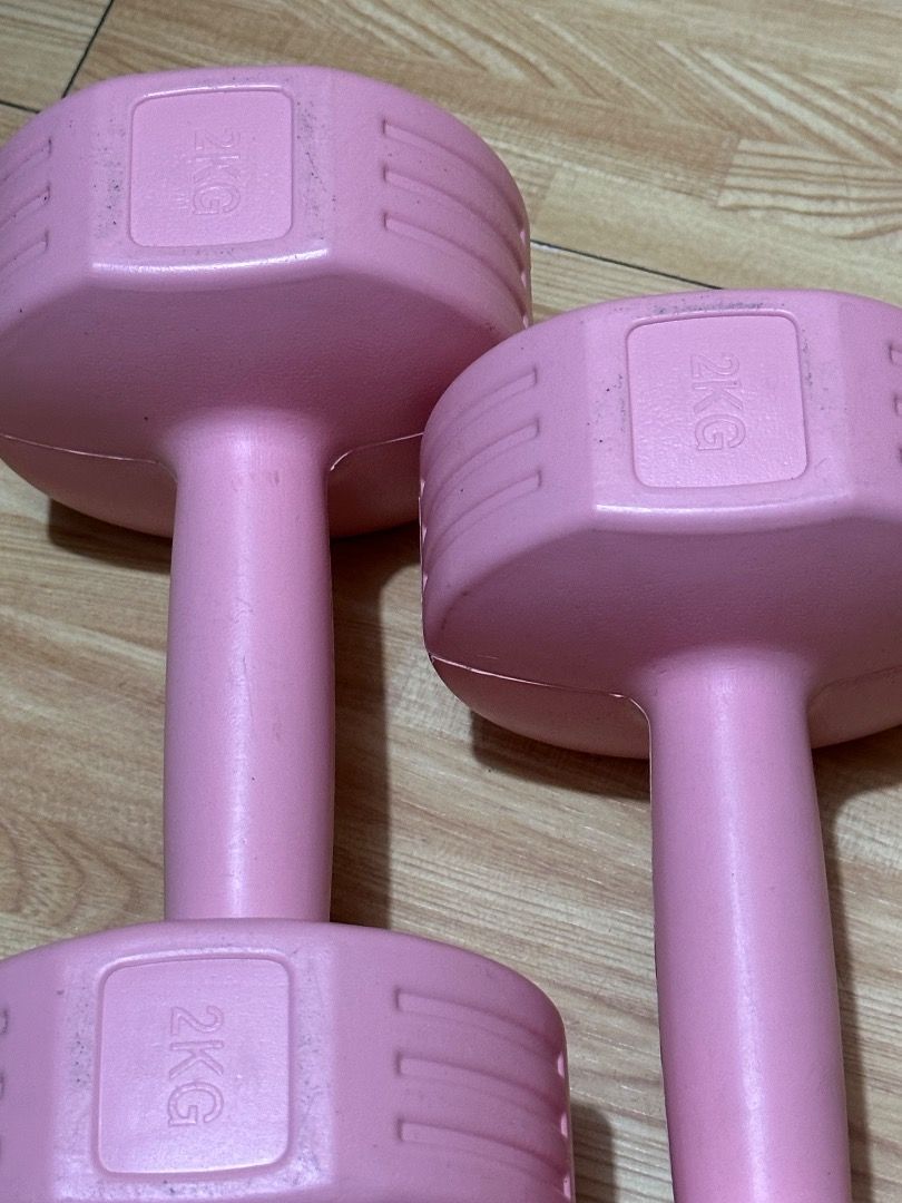 pink dumbbells 2kg x 2 (Category: Weights & Dumbbells) located in Cainta. Submitted by everywonchil (Listing ID 1460316531, Image 2). Description: - rarely used - 2kg per dumbbell.