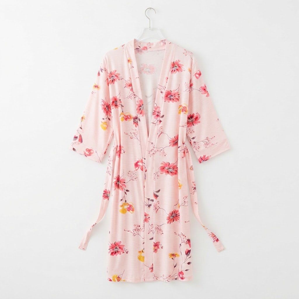 Pink Floral Kimono Robe (Category: Undergarments & Loungewear) located in Manila. Submitted by daintywears (Listing ID 1460396118, Image 1). Description: robe, my height is 5’2 and hanggang within knee ko siya. - Light pink robe with a beautiful floral print - Features red, pink, and yellow flowers all over - Comes with a tie belt - Perfect for lounging or as a cover-up - Made from soft fabric for a comfortable fit.