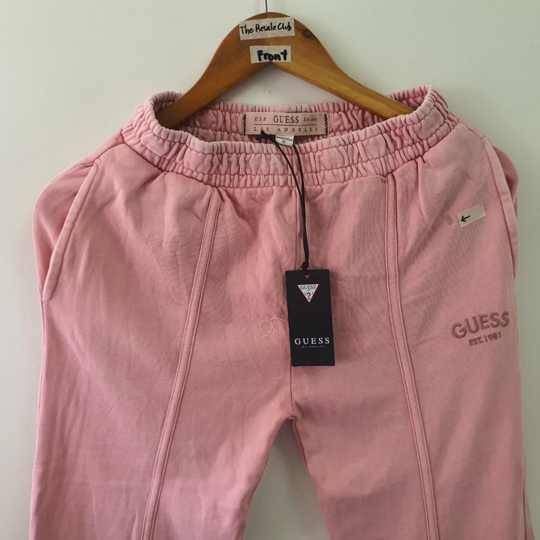 Pink Guess Est. 1981 Sweatpants (Category: Babies & Kids Fashion) located in Tarlac. Submitted by resaleclub (Listing ID 1460467543, Image 2). Description: - Pink Guess sweatpants - Embroidered logo detail - Comfortable elastic waistband with drawstring - Ideal for everyday casual wear - please check photos for stain, discoloration, pinhole or mending. Bawal po sa maselan.