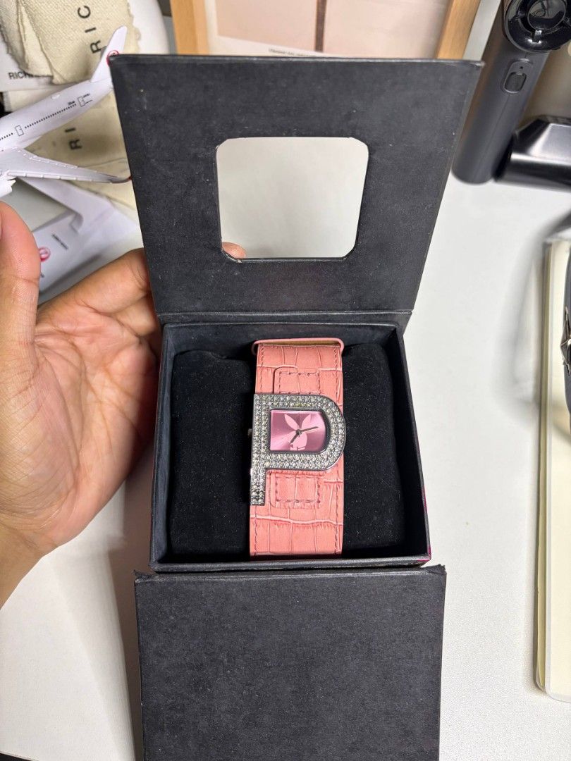 Pink Playboy "P" Watch with Rhinestones (Category: Women's Watches) located in Manila. Submitted by freeocean-4a848f (Listing ID 1460498963, Image 3). Description: For sale Original Playboy vintage/Y2K ladies’ watch 💗 -Pink genuine leather strap -Crystal/rhinestone design With original Playboy box + hologram sticker ✨ Good overall condition ⚠️ Battery needs replacement; currently not running ₱3,500 negotiable PM for inquiries 😊.