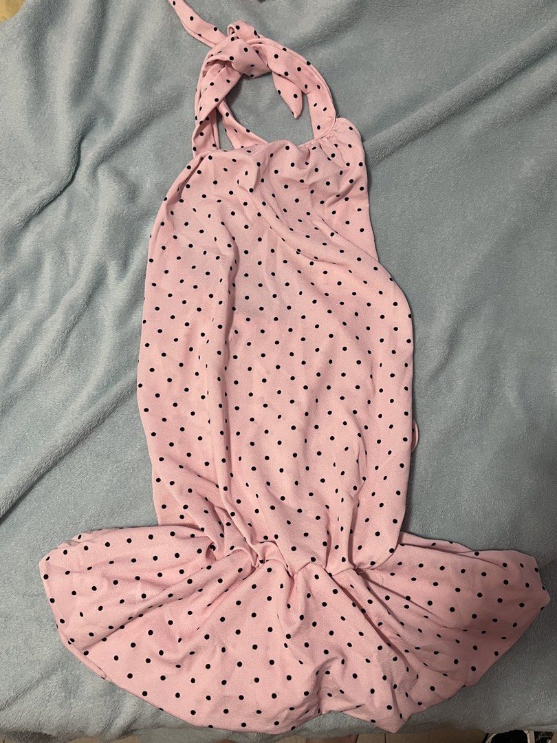 Pink Polka Dot Halter Neck Dress (Category: Dresses) located in Paranaque City. Submitted by aunocrate (Listing ID 1460431979, Image 2). Description: - Flattering halter neck with adjustable tie back. - Never been used. - Fabric: Crepe - With safety shorts inside. - MOP: Gcash, Gotyme.