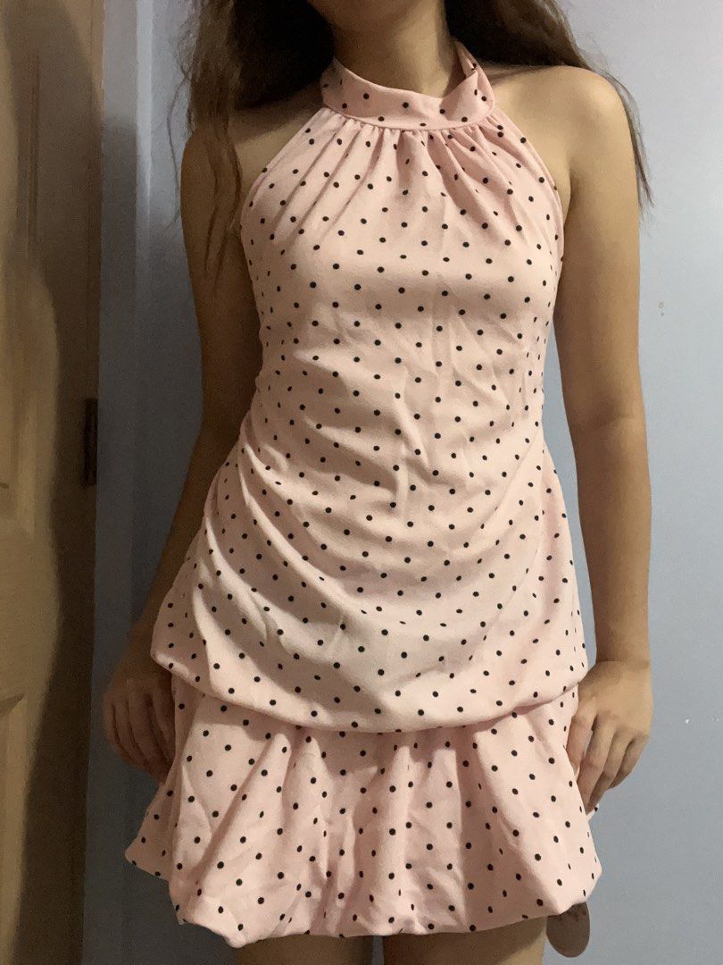 Pink Polka Dot Halter Neck Dress (Category: Dresses) located in Paranaque City. Submitted by aunocrate (Listing ID 1460431979, Image 1). Description: - Flattering halter neck with adjustable tie back. - Never been used. - Fabric: Crepe - With safety shorts inside. - MOP: Gcash, Gotyme.