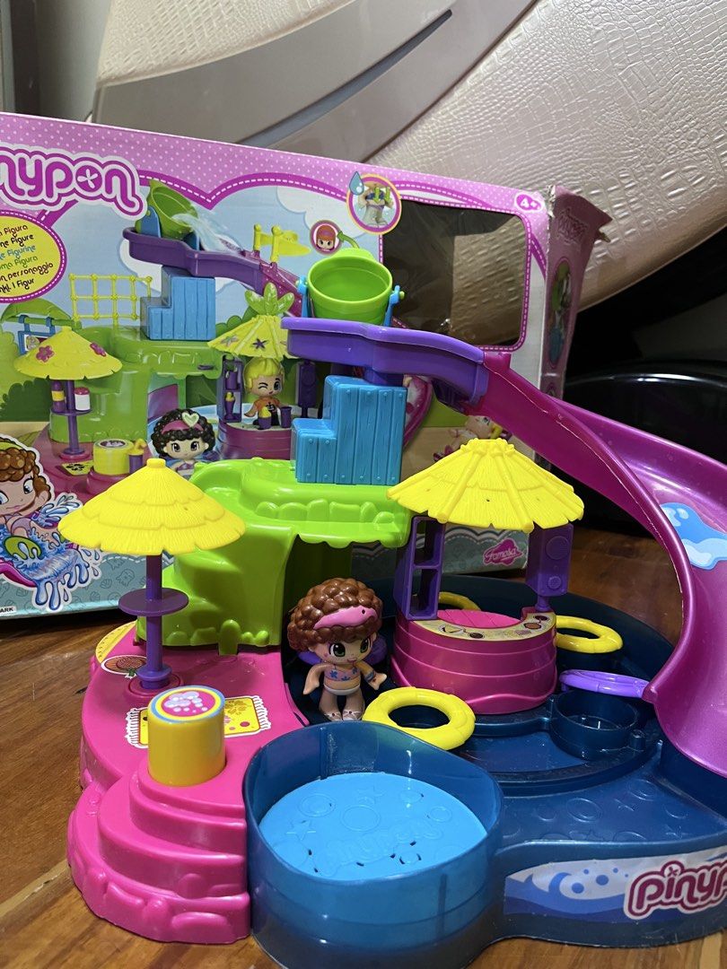 Pinypon Water Park Playset with Figures (Category: Kids Toys) located in Manila. Submitted by oogbe (Listing ID 1460364934, Image 1). Description: - Pinypon Water Park Playset - Includes slides, pool, and accessories - Comes with a few Pinypon figures - Encourages imaginative play - Original box included (shows wear).