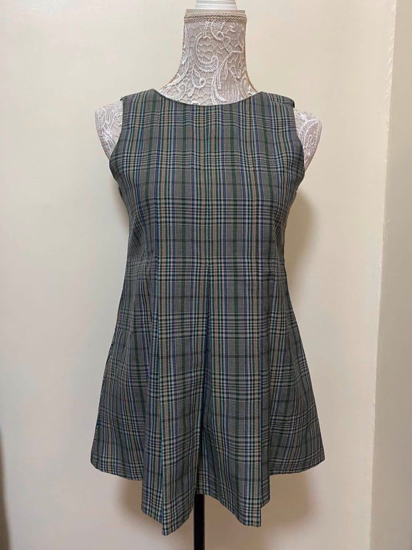 Plaid Sleeveless A-Line Dress (Category: Dresses) located in Manila. Submitted by airamef28.closet (Listing ID 1460416682, Image 1). Description: - Adorable plaid A-line dress - Features green, blue, and tan color tones - Sleeveless design - Versatile: wear alone or layer over a long-sleeve top - Ideal for casual outings or a school uniform aesthetic.