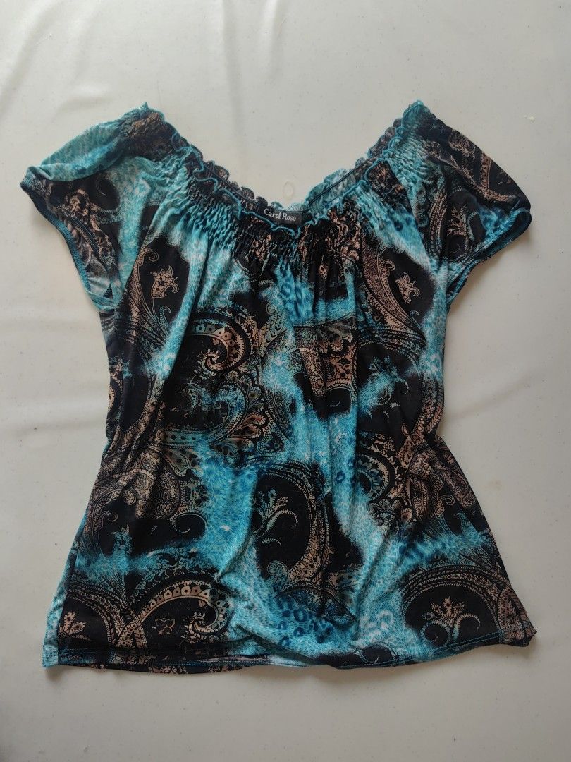 Plus Size Short Sleeve Paisley Top (Category: Blouses) located in Taguig. Submitted by chielatte (Listing ID 1460342082, Image 1). Description: 00125 short-sleeve blouse featuring a vibrant blue and black paisley print with a smocked neckline b45xL25.