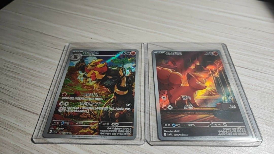 Pokemon KR AR Cards (Category: Raw Singles) located in Quezon City. Submitted by karlo.regino (Listing ID 1460478658, Image 1). Description: Korean Pyroar AR and Vulpix AR. 350 for both Location: Cubao, QC Shipping shouldered by buyer Shipping via: LBC/Lalamove/Meet-up (Card shows only) Payment via: GCash/Maya.