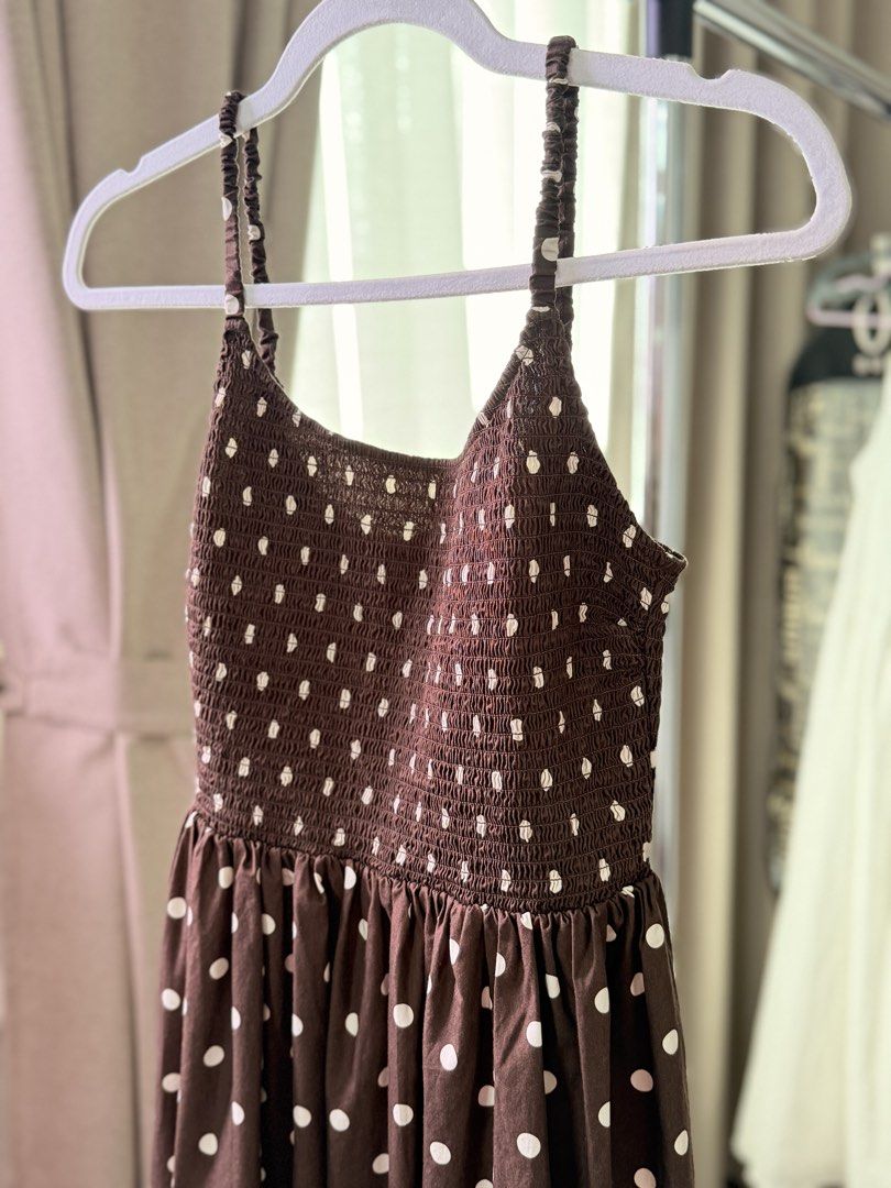 Polka Dot Smocked Maxi Dress (Category: Dresses) located in Santa Rosa. Submitted by rainscloset29 (Listing ID 1460392333, Image 2). Description: Size M • Worn twice only • Brown/mauve with cream polka dot print • Smocked fitted bodice • Flowy maxi-length • Feminine and flattering silhouette • Very good condition • No stains, holes, or major flaws • Selling as part of my decluttering 📍 Sta. Rosa, Laguna 🚚 Shipping available at buyer’s expense.