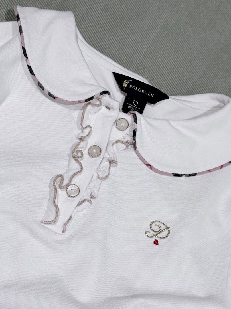 POLO brand X Bur berry print (Category: Babies & Kids Fashion) located in Taguig. Submitted by annebydesign (Listing ID 1460374573, Image 2). Description: POLO brand X Bur berry print ₱400 Brand new. Washed but never used (Ayaw ng daughter k s collar daw) Fits 10-12yrs old Gagamitin sana s golf competition With POLO logo in front, pati butones may logo.