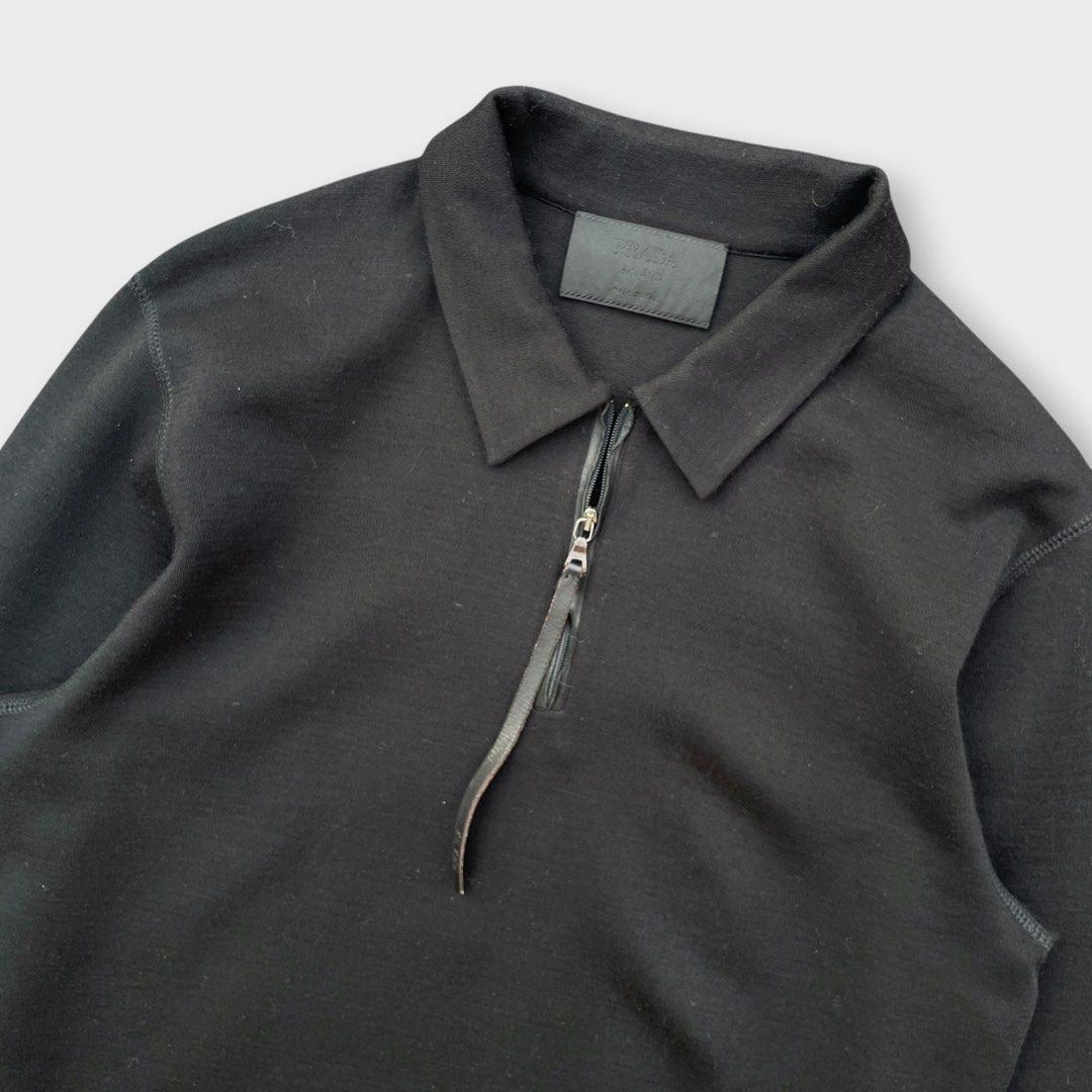Prada - Vintage Quarter-zip Wool Pullover with Leather Lining Slim (Category: Coats, Jackets and Outerwear) located in Los Banos. Submitted by declutterking (Listing ID 1460470954, Image 2). Description: Size XL on tag • leather-lined zipper • engraved zipper • quarter zip design • 45% virgin wool | 45% acrylic • sizing is kind of small, please check measurements before sending an offer Dimensions: 17.25" shoulders 20" chest 28" length 26.5" slee