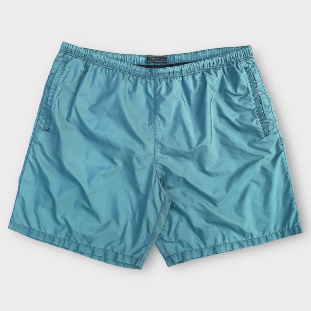 Prada - Vintage Teal Swimming Shorts (Category: Shorts) located in Los Banos. Submitted by declutterking (Listing ID 1460489470, Image 1). Description: Size 54 on tag Dimensions: 17" waist 11" front rise 17.25" length 12.25" leg opening Excellent condition Authentic.